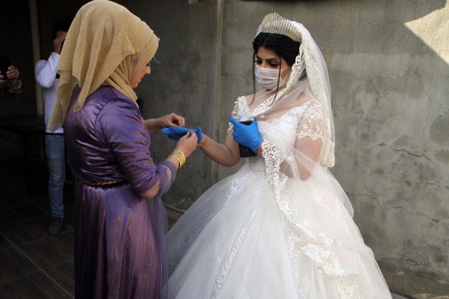 زواج في العراق في فترة الوباء - تصوير شينخوا